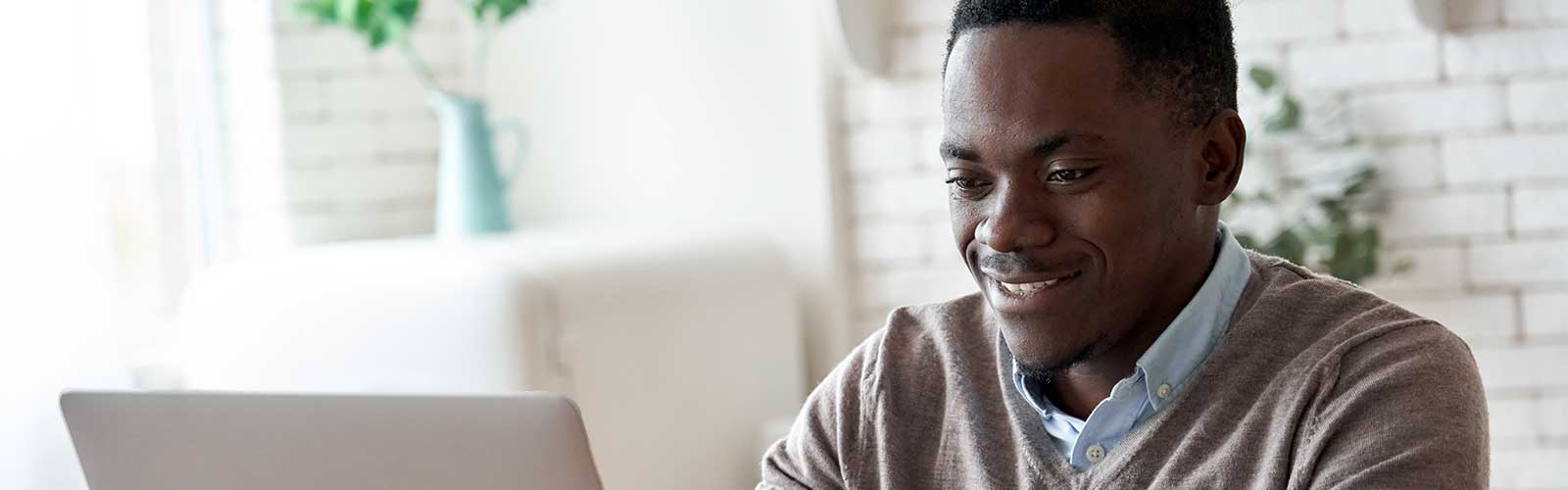 Man checks his secure online banking account