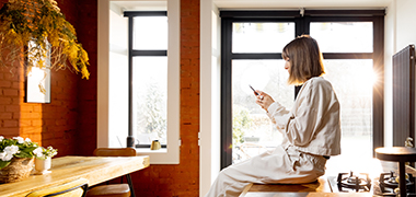 Woman using Mobile Banking